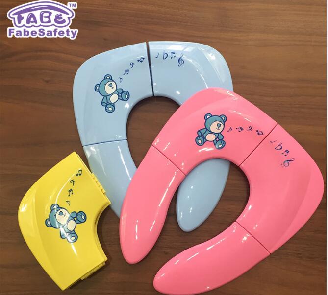 Folding potty training seat