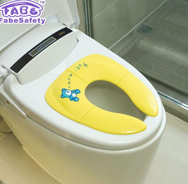 Folding potty training seat