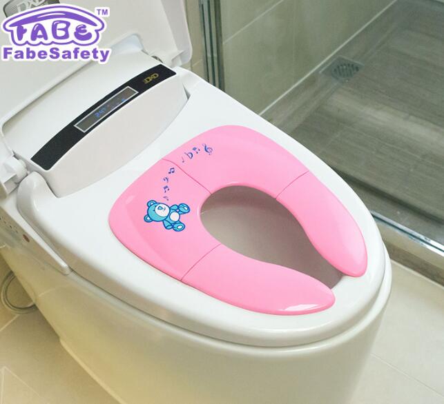 Folding potty training seat