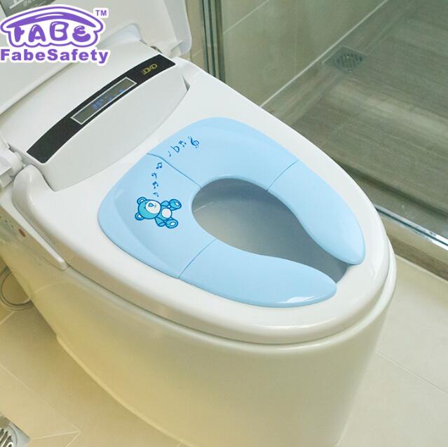 Folding potty training seat