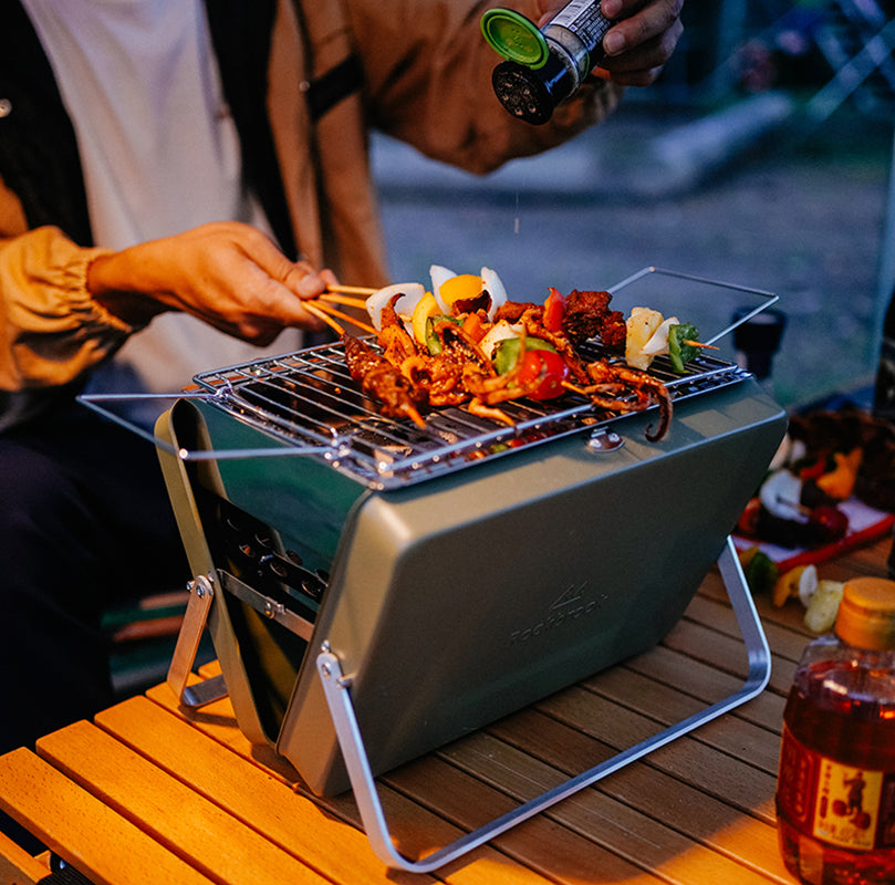 Portable folding grill